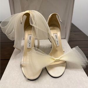 Jimmy Choo Aveline 100MM Tulle Bow Sandals
Color: LATTE